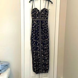 Bariano black dress size 2 with slit in the back spaghetti strap with bra top